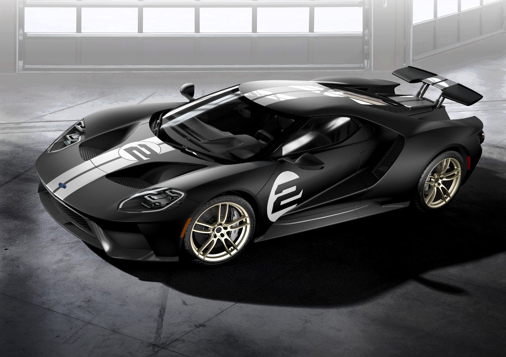 All-new Ford GT '66 Heritage Edition with unique black and silver-stripe livery celebrates 1966 Le Mans-winning GT40 Mark II race car driven by Bruce McLaren and Chris Amon